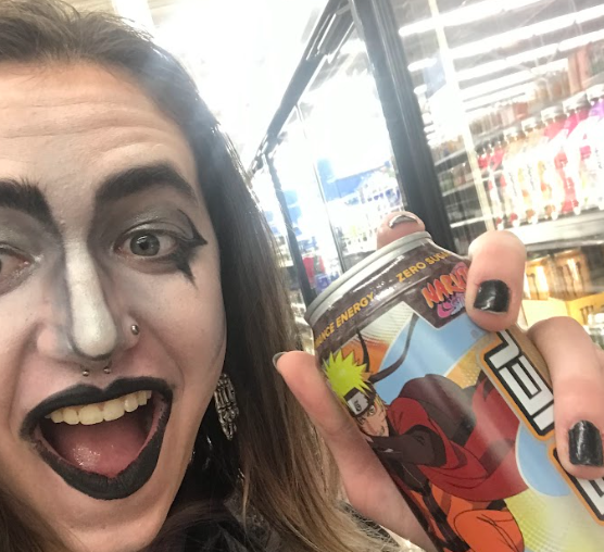 Penny holding a can of Nauto GFuel